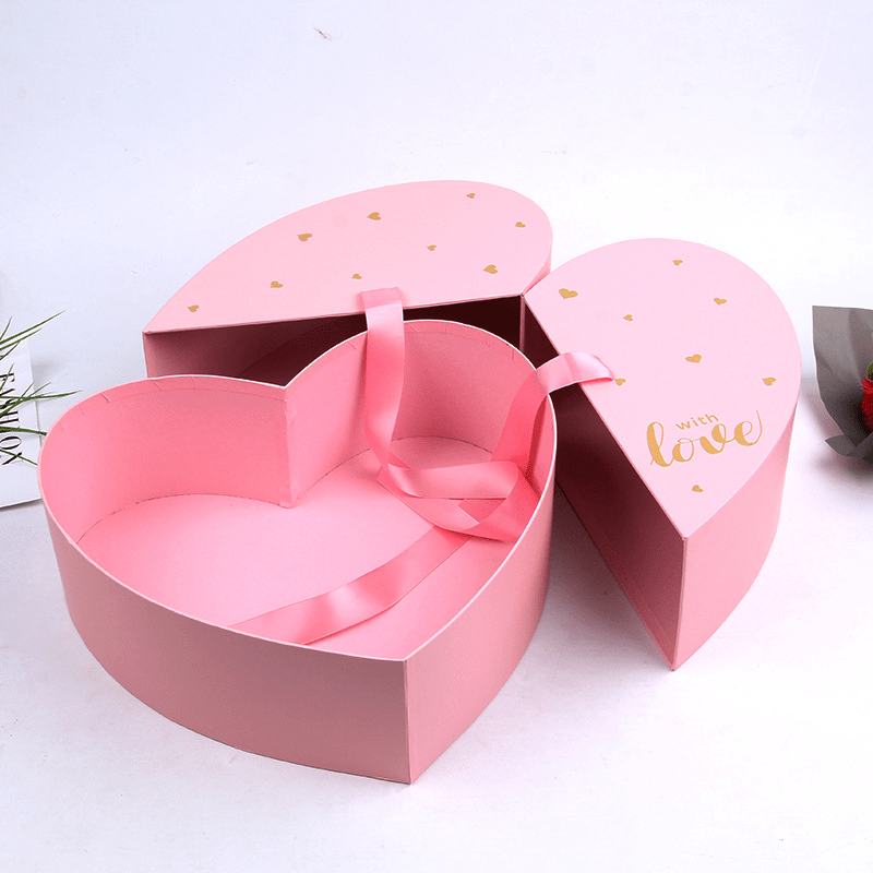 Caja De Regalo De Color Rosa En Forma De Corazón Con La Cinta