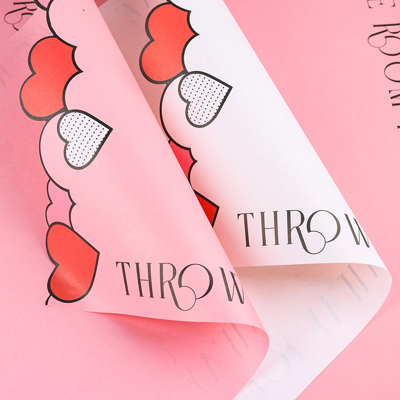 PAPEL KRAFT ESTAMPADO DE CORAZONES